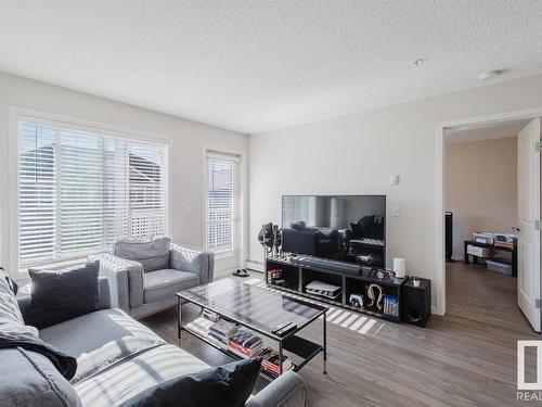 327 1820 Rutherford Road, Edmonton, AB - Indoor Photo Showing Living Room