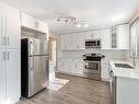 18003 76 Avenue, Edmonton, AB  - Indoor Photo Showing Kitchen With Double Sink With Upgraded Kitchen 