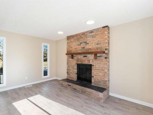 18003 76 Avenue, Edmonton, AB - Indoor Photo Showing Living Room With Fireplace