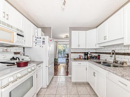 11 2911 36 Street, Edmonton, AB - Indoor Photo Showing Kitchen With Double Sink