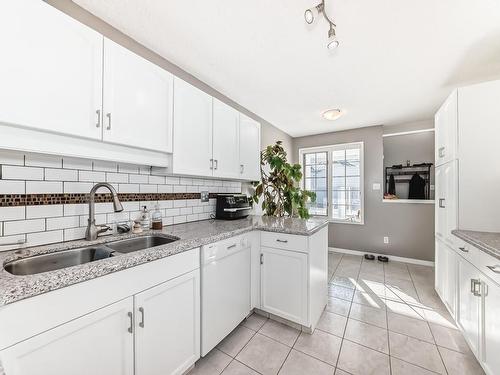 11 2911 36 Street, Edmonton, AB - Indoor Photo Showing Kitchen With Double Sink