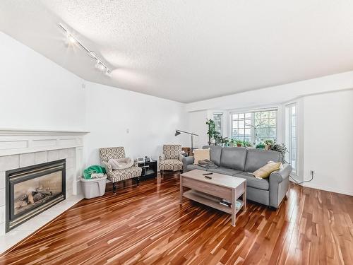 11 2911 36 Street, Edmonton, AB - Indoor Photo Showing Living Room With Fireplace