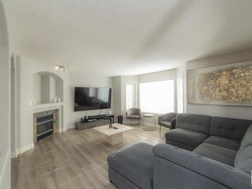 42 1295 Carter Crest Road, Edmonton, AB - Indoor Photo Showing Living Room With Fireplace