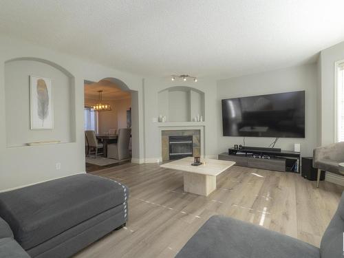 42 1295 Carter Crest Road, Edmonton, AB - Indoor Photo Showing Living Room With Fireplace