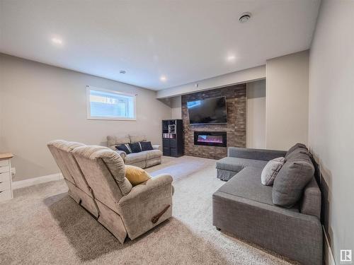 12819 202 Street, Edmonton, AB - Indoor Photo Showing Basement With Fireplace