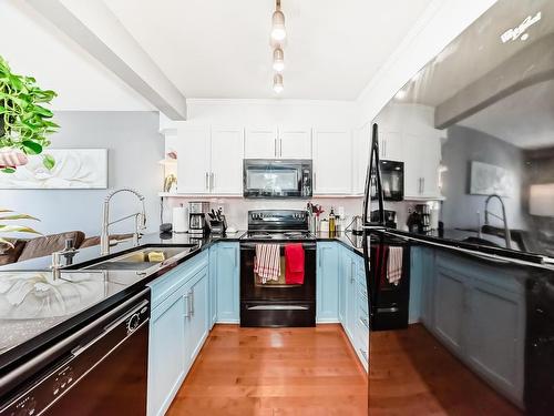 96 230 Edwards Drive, Edmonton, AB - Indoor Photo Showing Kitchen With Double Sink