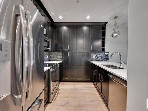 113 11080 Ellerslie Road, Edmonton, AB - Indoor Photo Showing Kitchen With Double Sink With Upgraded Kitchen