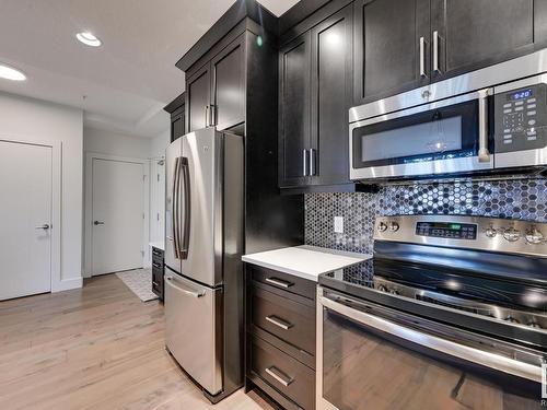 113 11080 Ellerslie Road, Edmonton, AB - Indoor Photo Showing Kitchen