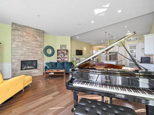 1 7570 May Common, Edmonton, AB - Indoor With Fireplace