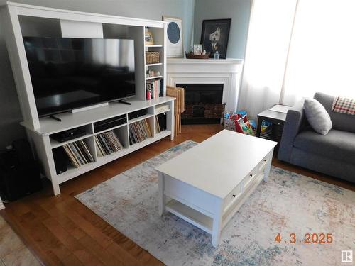 9355 52 Street, Edmonton, AB - Indoor Photo Showing Living Room With Fireplace