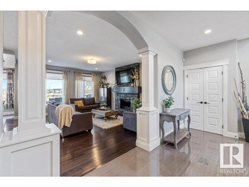 535 Albany Way, Edmonton, AB - Indoor Photo Showing Living Room With Fireplace