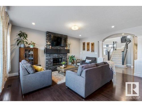 535 Albany Way, Edmonton, AB - Indoor Photo Showing Living Room With Fireplace