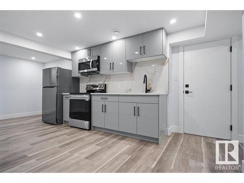 8307 14 Avenue, Edmonton, AB - Indoor Photo Showing Kitchen With Upgraded Kitchen