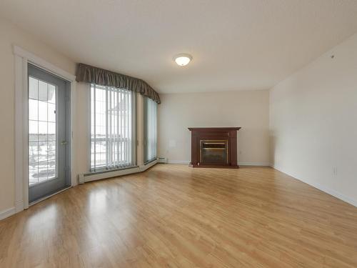 435 2741 55 Street, Edmonton, AB - Indoor Photo Showing Living Room With Fireplace