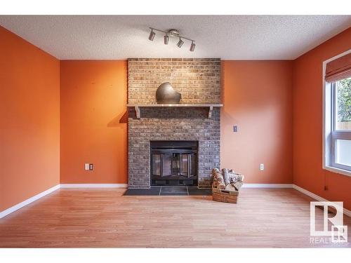 17811 60 Ave, Edmonton, AB - Indoor Photo Showing Living Room With Fireplace