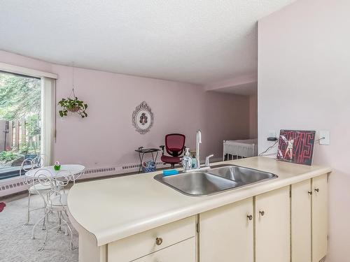 104 11618 100 Avenue, Edmonton, AB - Indoor Photo Showing Kitchen With Double Sink