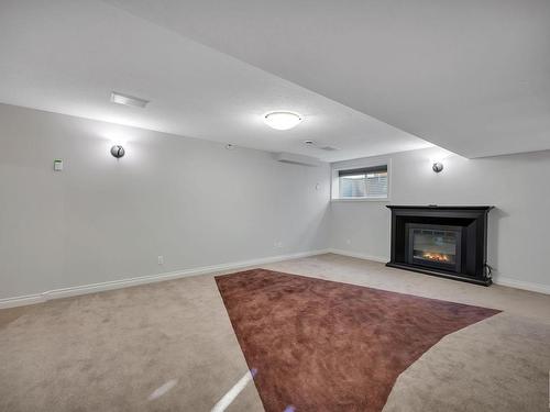 5478 Thibault Wynd, Edmonton, AB - Indoor With Fireplace