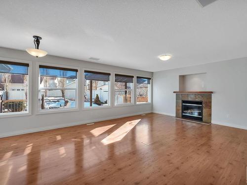 5478 Thibault Wynd, Edmonton, AB - Indoor Photo Showing Living Room With Fireplace