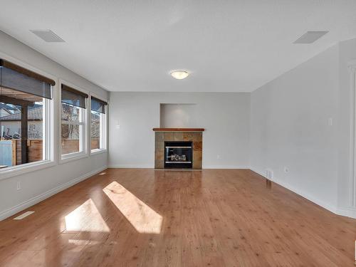 5478 Thibault Wynd, Edmonton, AB - Indoor Photo Showing Living Room With Fireplace