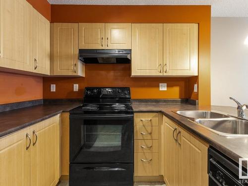 305 11449 Ellerslie Road, Edmonton, AB - Indoor Photo Showing Kitchen With Double Sink