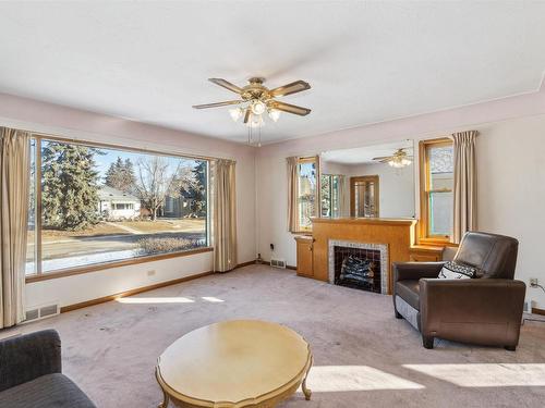 11315 110A Avenue, Edmonton, AB - Indoor Photo Showing Living Room With Fireplace