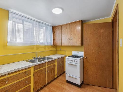 11315 110A Avenue, Edmonton, AB - Indoor Photo Showing Kitchen With Double Sink