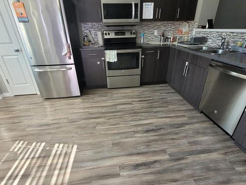 3221 Cherry Crescent, Edmonton, AB - Indoor Photo Showing Kitchen With Double Sink With Upgraded Kitchen