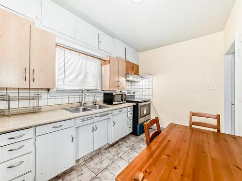 11606 95 Street, Edmonton, AB - Indoor Photo Showing Kitchen With Double Sink