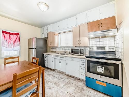 11606 95 Street, Edmonton, AB - Indoor Photo Showing Kitchen With Double Sink