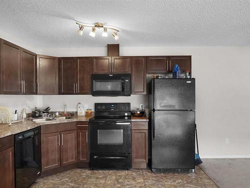 130 301 Clareview Station Drive, Edmonton, AB - Indoor Photo Showing Kitchen With Double Sink