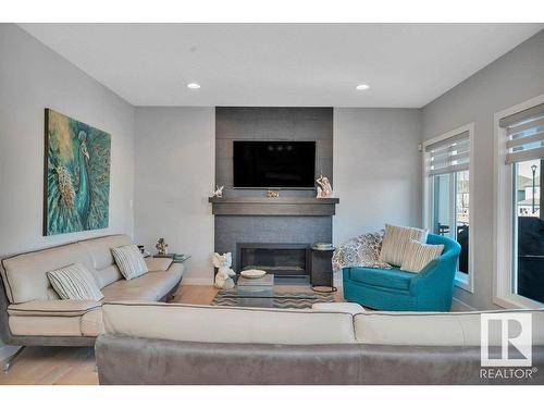 3209 Winspear Crescent, Edmonton, AB - Indoor Photo Showing Living Room With Fireplace