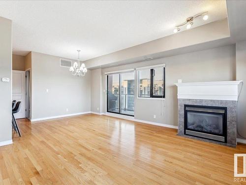 608 10319 111 Street, Edmonton, AB - Indoor Photo Showing Living Room With Fireplace