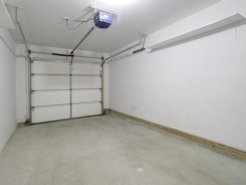 117 12050 17 Avenue, Edmonton, AB - Indoor Photo Showing Garage