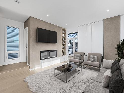 9252 76 Street, Edmonton, AB - Indoor Photo Showing Living Room With Fireplace