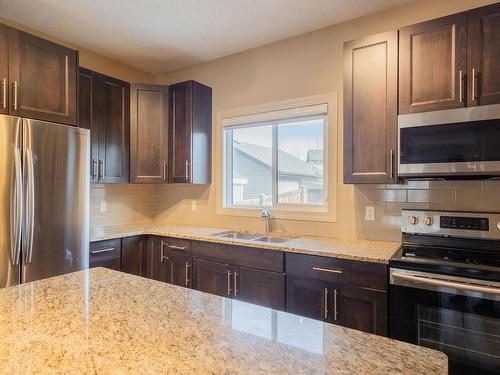 6921 Cardinal Wynd, Edmonton, AB - Indoor Photo Showing Kitchen With Double Sink