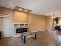 6921 Cardinal Wynd, Edmonton, AB  - Indoor Photo Showing Living Room With Fireplace 