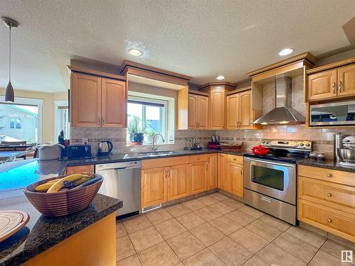 7415 169 Avenue, Edmonton, AB - Indoor Photo Showing Kitchen With Double Sink