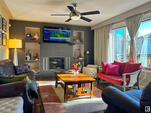 7415 169 Avenue, Edmonton, AB - Indoor Photo Showing Living Room With Fireplace