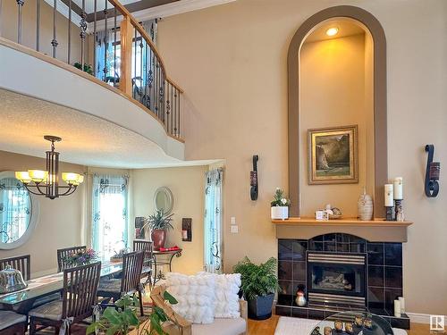 7415 169 Avenue, Edmonton, AB - Indoor Photo Showing Dining Room With Fireplace