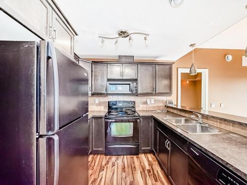 22 2565 Hanna Crescent, Edmonton, AB - Indoor Photo Showing Kitchen With Double Sink