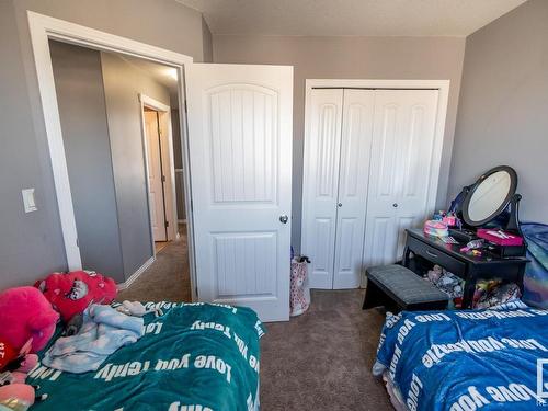 #20 Spruce Boulevard, Leduc, AB - Indoor Photo Showing Bedroom