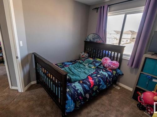 #20 Spruce Boulevard, Leduc, AB - Indoor Photo Showing Bedroom