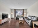 106 14808 125 Street, Edmonton, AB  - Indoor Photo Showing Living Room 