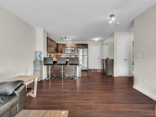 106 14808 125 Street, Edmonton, AB - Indoor Photo Showing Living Room