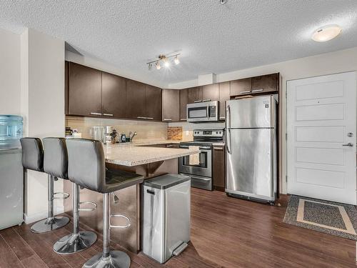 106 14808 125 Street, Edmonton, AB - Indoor Photo Showing Kitchen With Stainless Steel Kitchen With Upgraded Kitchen