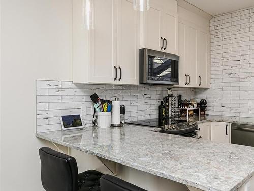 3730 8 Avenue, Edmonton, AB - Indoor Photo Showing Kitchen With Upgraded Kitchen