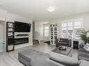 3730 8 Avenue, Edmonton, AB  - Indoor Photo Showing Living Room With Fireplace 