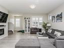 3730 8 Avenue, Edmonton, AB  - Indoor Photo Showing Living Room With Fireplace 