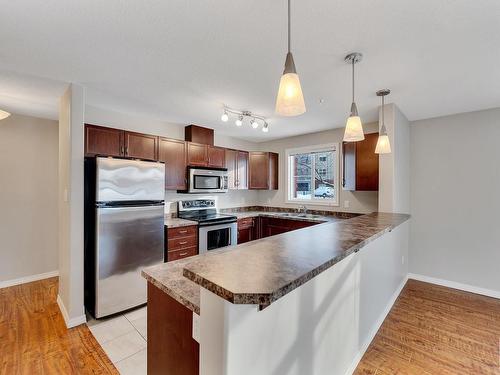 126 7909 71 Street, Edmonton, AB - Indoor Photo Showing Kitchen With Stainless Steel Kitchen