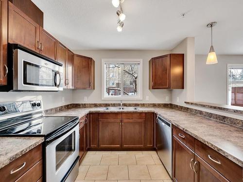 126 7909 71 Street, Edmonton, AB - Indoor Photo Showing Kitchen With Double Sink